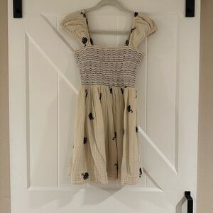 Cream Smocked Dress with Black Floral Accents